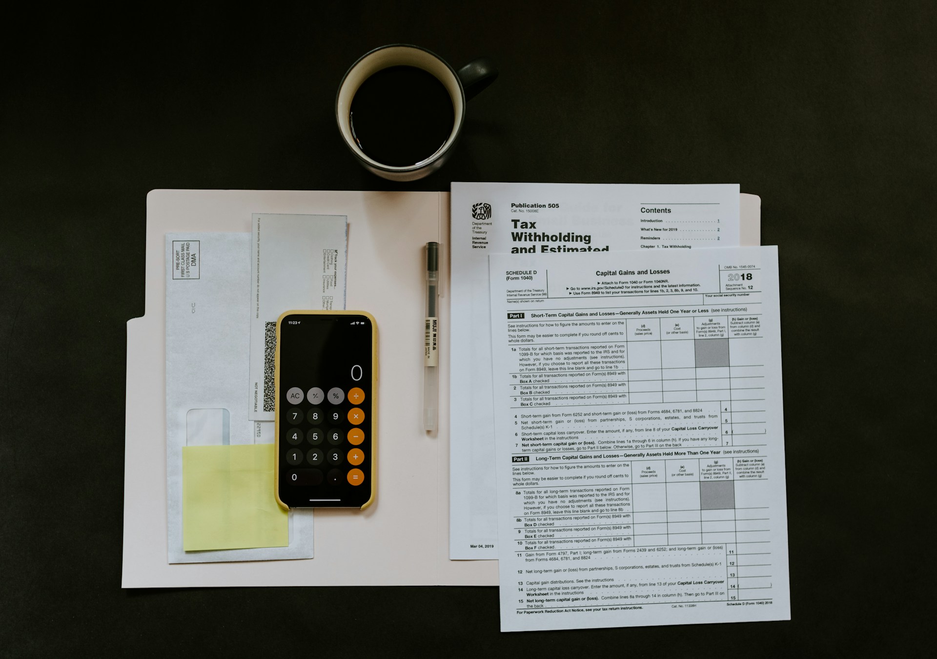 Organizing tax documents, calculator and forms